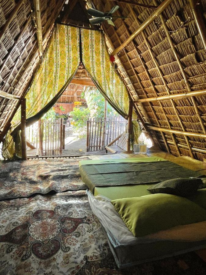Tribal Huts Community Hostel Daanbantayan Luaran gambar