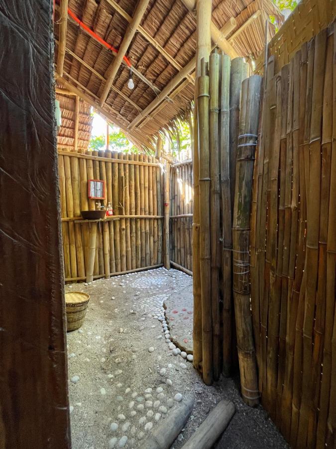 Tribal Huts Community Hostel Daanbantayan Bilik gambar